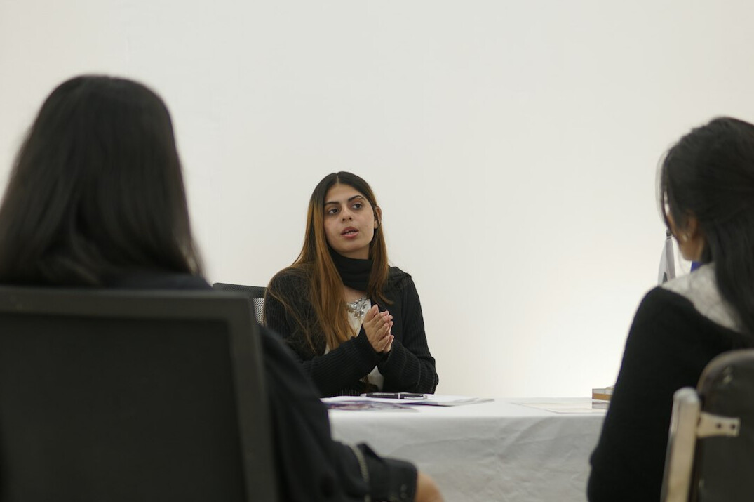 woman leading team meeting
