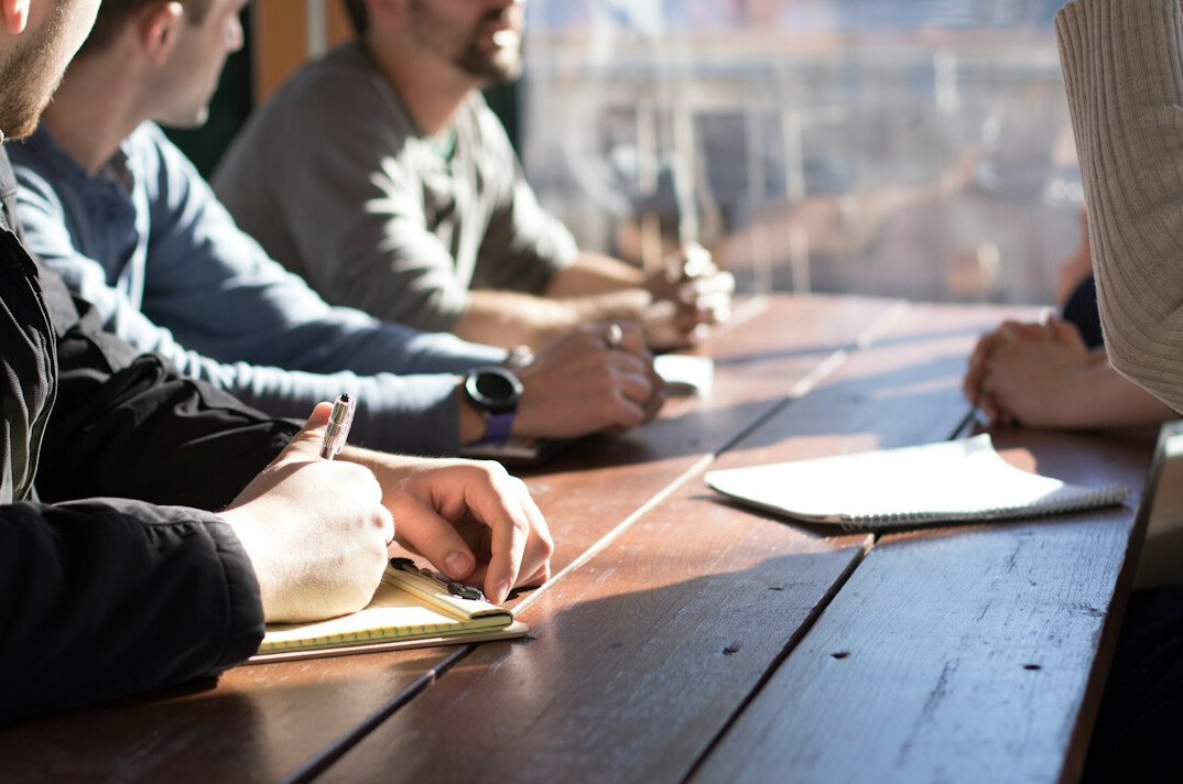 business leader in meeting