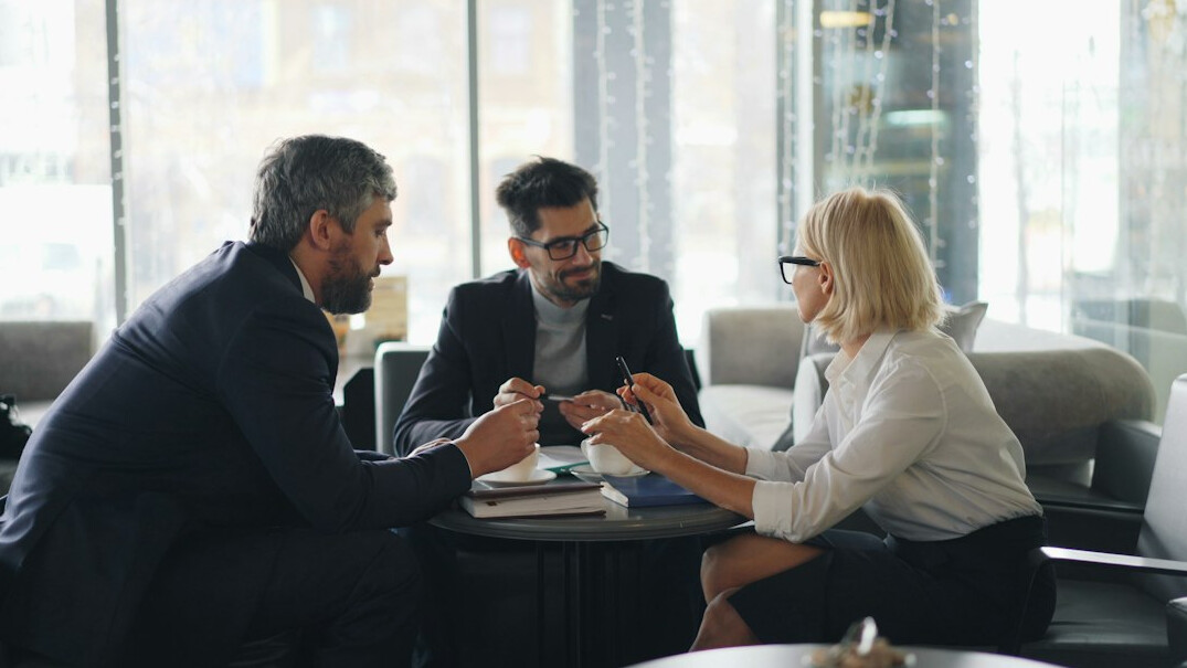 business leader in meeting